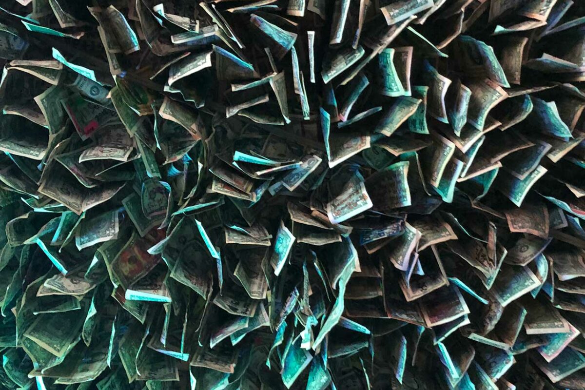 Dollar bills on the ceiling at No Name Pub