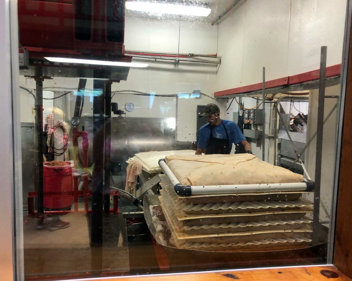 Employee working at Cold Hollow Cider Mills