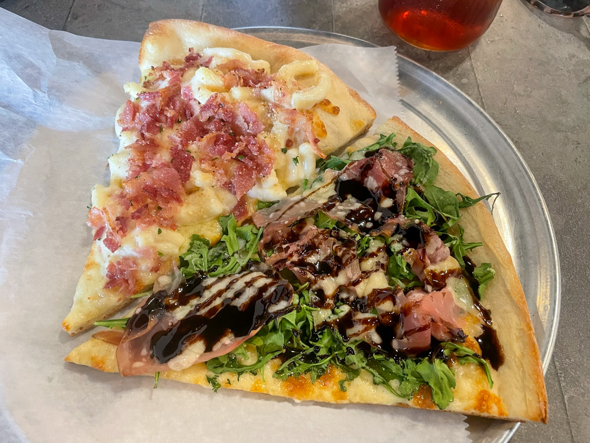 Two slices of pizza at Bellini's Eatery