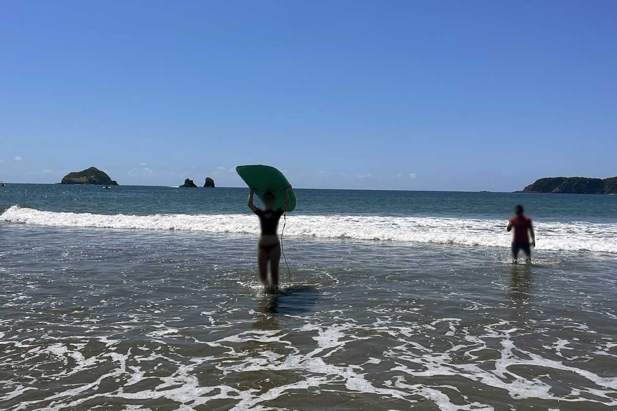 My daughter surfing at Playa Espadilla Norte