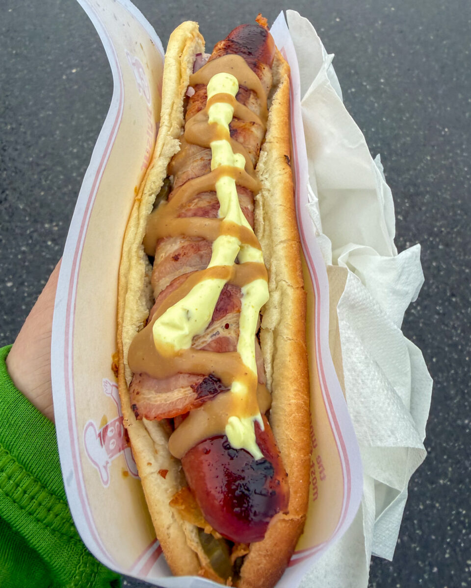 Icelandic hot dog after adding mustard and remoulade