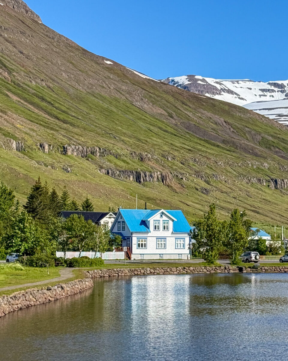 A pretty blue-roofed building in Seyðisfjörður
